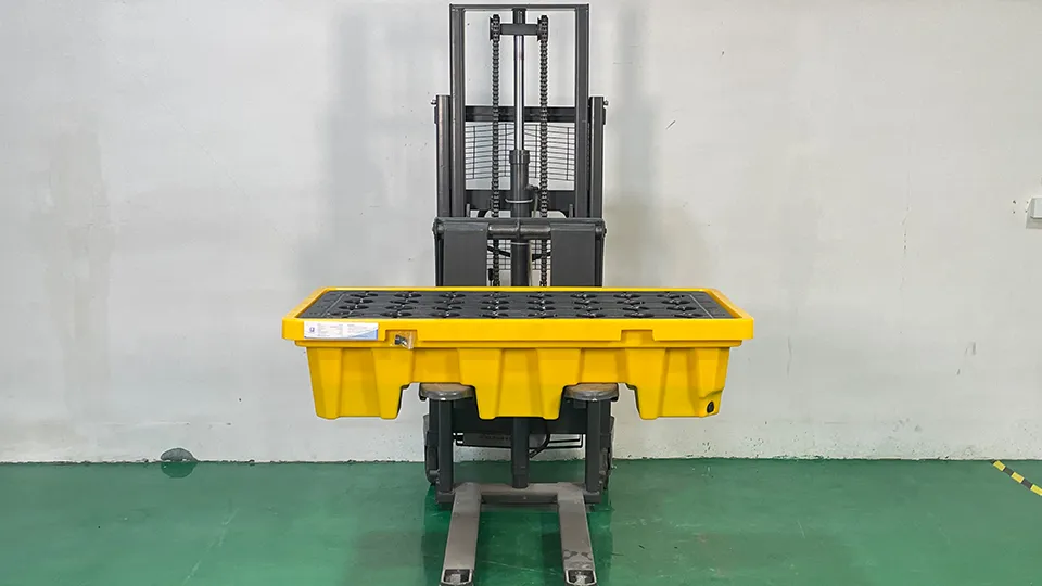 Forklift lifts a spill pallet